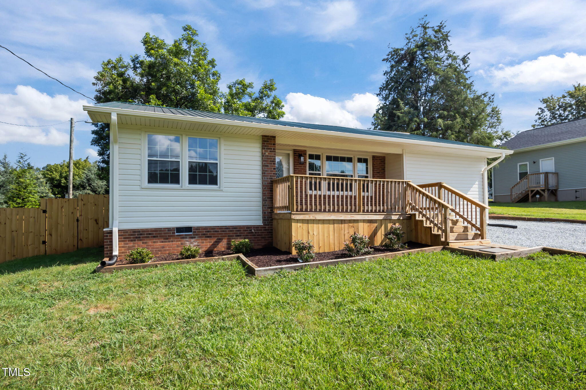 150 Summit Street Roxboro, NC 27573 - Photo 6 of 37 a view of a house with a yard and sitting area