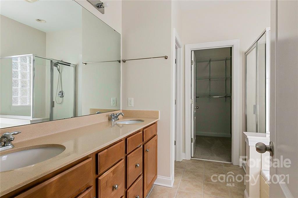 10426 Tom Short Road Charlotte, NC 28277 - Photo 14 of 17 a bathroom with a sink and a mirror