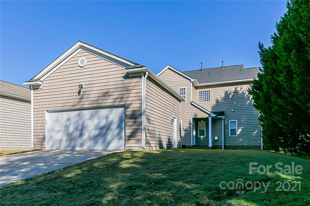 10426 Tom Short Road Charlotte, NC 28277 - Photo 16 of 17 a view of a house with a yard