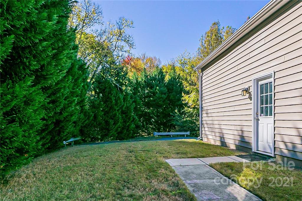 10426 Tom Short Road Charlotte, NC 28277 - Photo 17 of 17 a view of a house with backyard and garden
