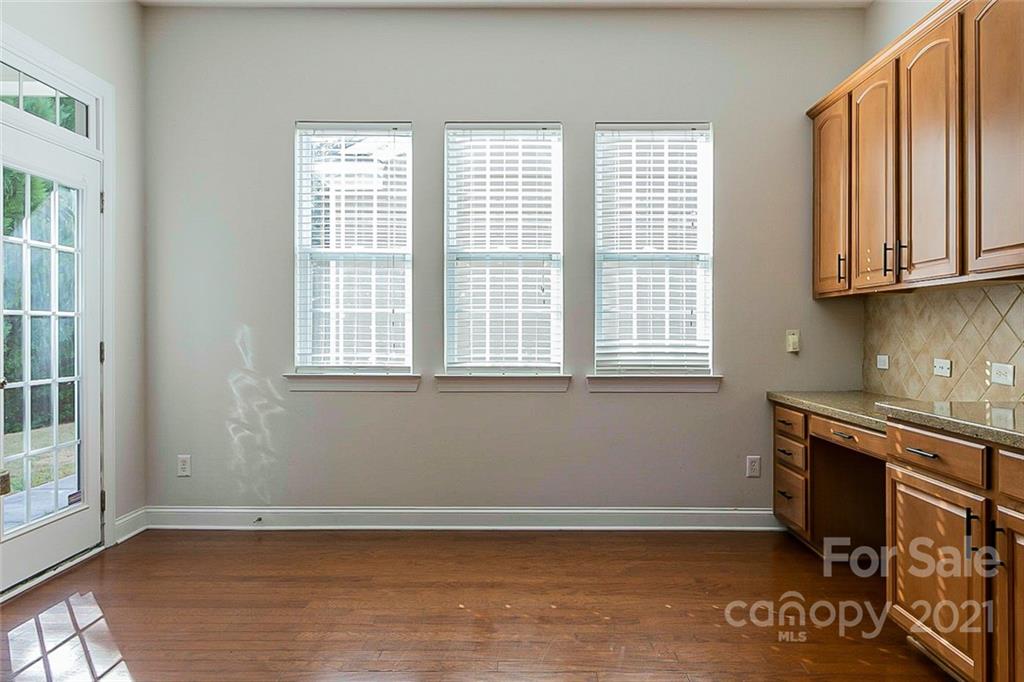 10426 Tom Short Road Charlotte, NC 28277 - Photo 6 of 17 a view of an empty room with a window