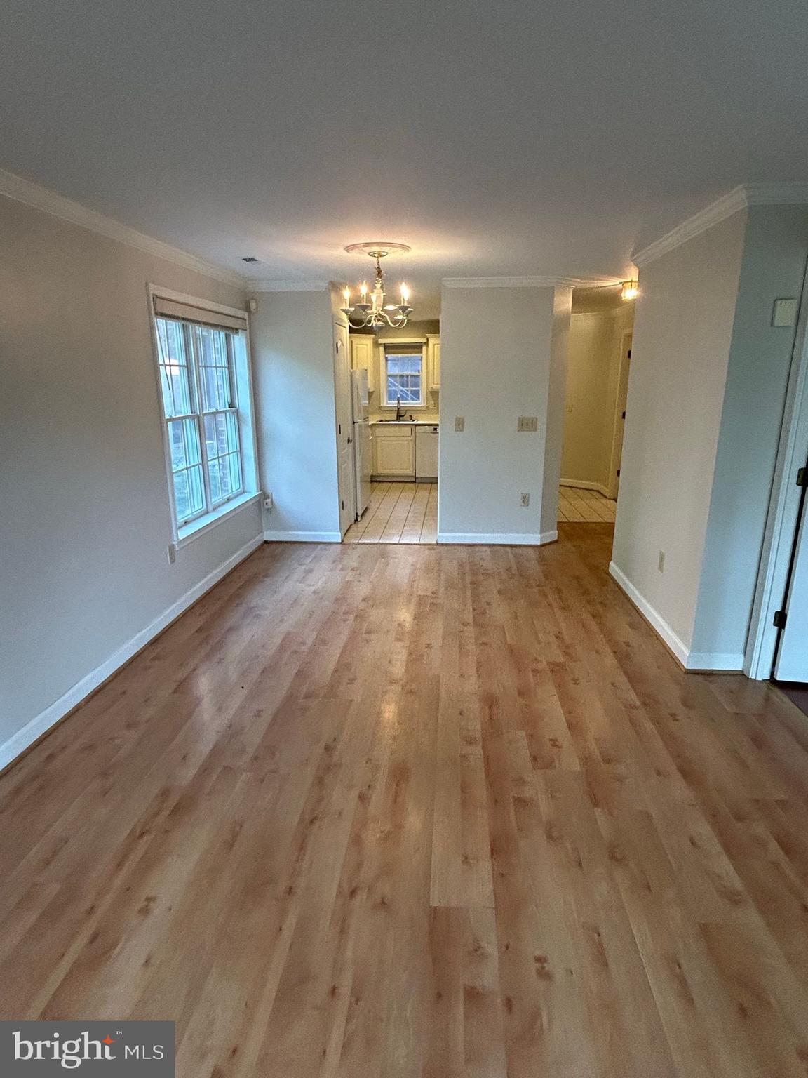 6924 Fairfax Drive, Unit 140 Arlington, VA 22213 - Photo 9 of 19 a view of an empty room and a window
