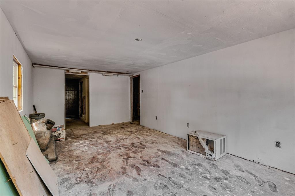 902 North Frances Street Terrell, TX 75160 - Photo 23 of 28 a view of a livingroom with wooden floor and a sink