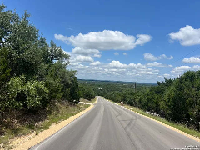 a view of a lake from a balcony