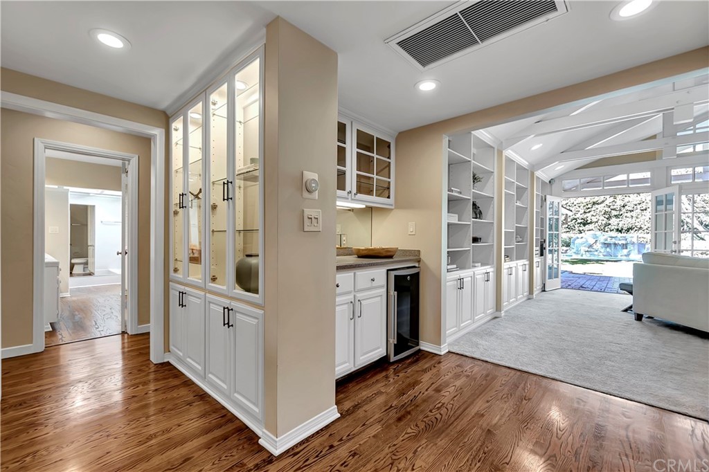 111 West Lemon Avenue Arcadia, CA 91007 - Photo 13 of 46 a kitchen with cabinets and wooden floor