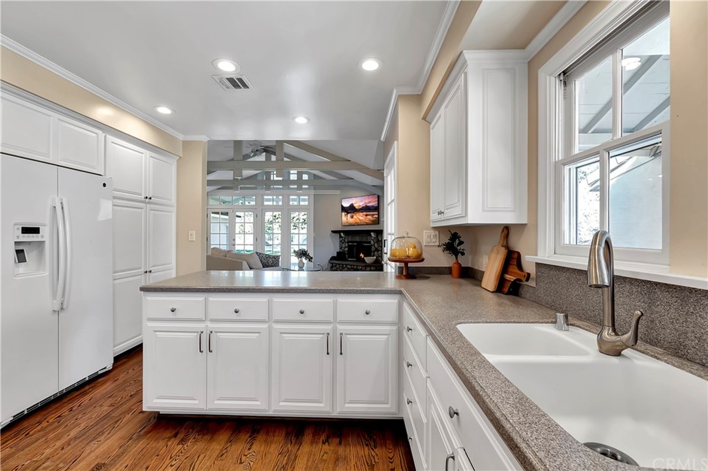 111 West Lemon Avenue Arcadia, CA 91007 - Photo 19 of 46 a kitchen with granite countertop a sink stainless steel appliances and cabinets