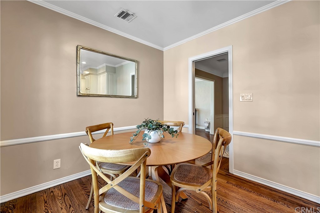 111 West Lemon Avenue Arcadia, CA 91007 - Photo 20 of 46 a dining room with furniture and wooden floor