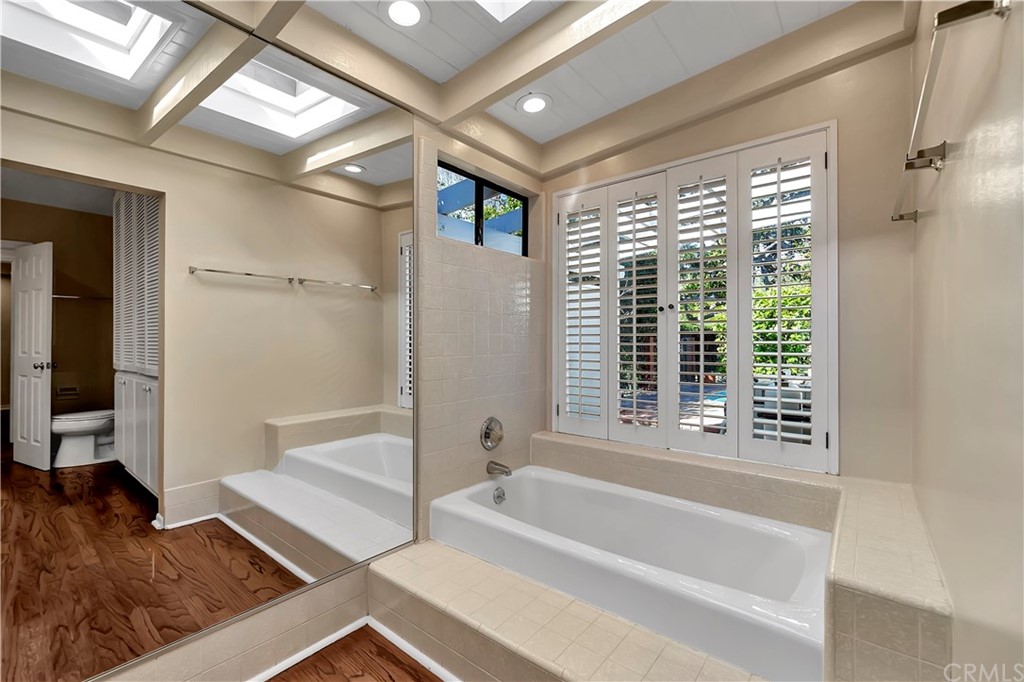 111 West Lemon Avenue Arcadia, CA 91007 - Photo 26 of 46 a bathroom with a bathtub and a shower