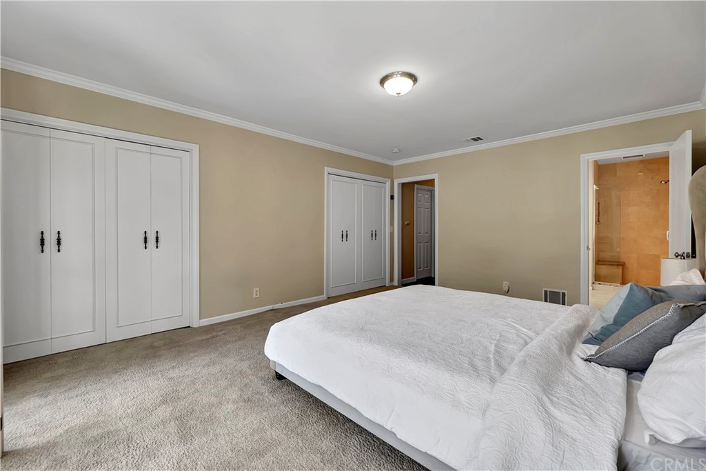 111 West Lemon Avenue Arcadia, CA 91007 - Photo 29 of 46 a bedroom with a bed and a window