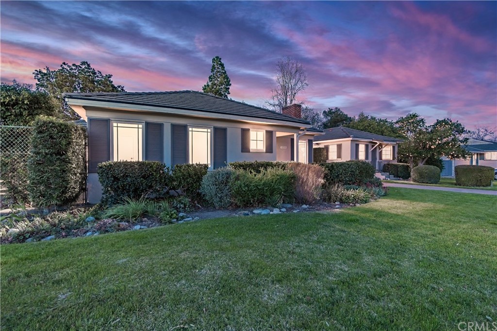 111 West Lemon Avenue Arcadia, CA 91007 - Photo 3 of 46 a front view of a house with garden