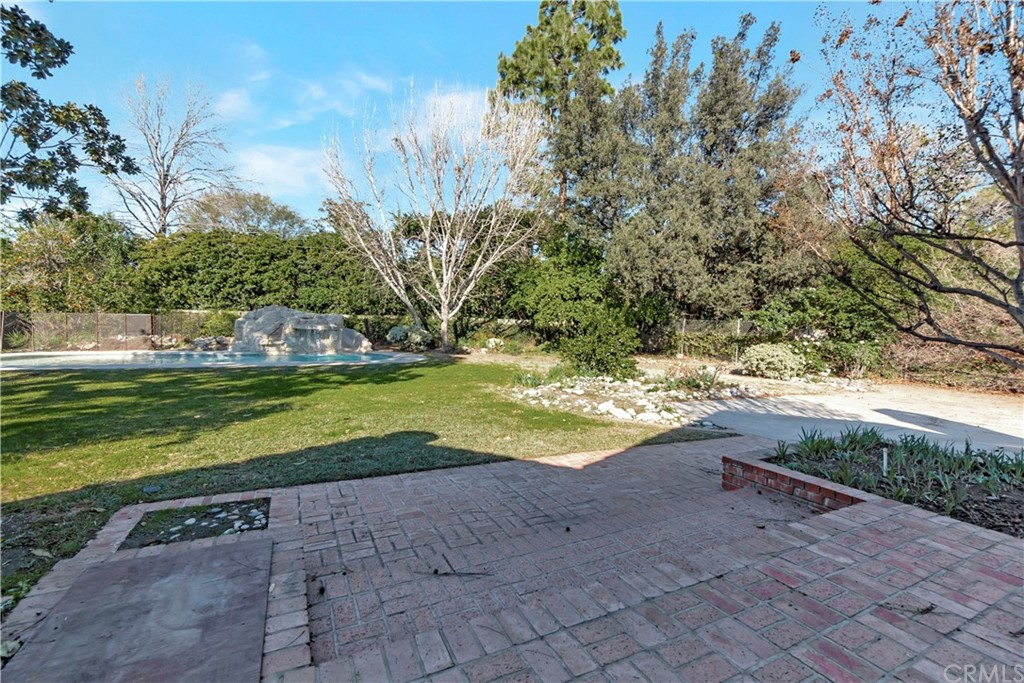 111 West Lemon Avenue Arcadia, CA 91007 - Photo 34 of 46 a view of swimming pool with a yard