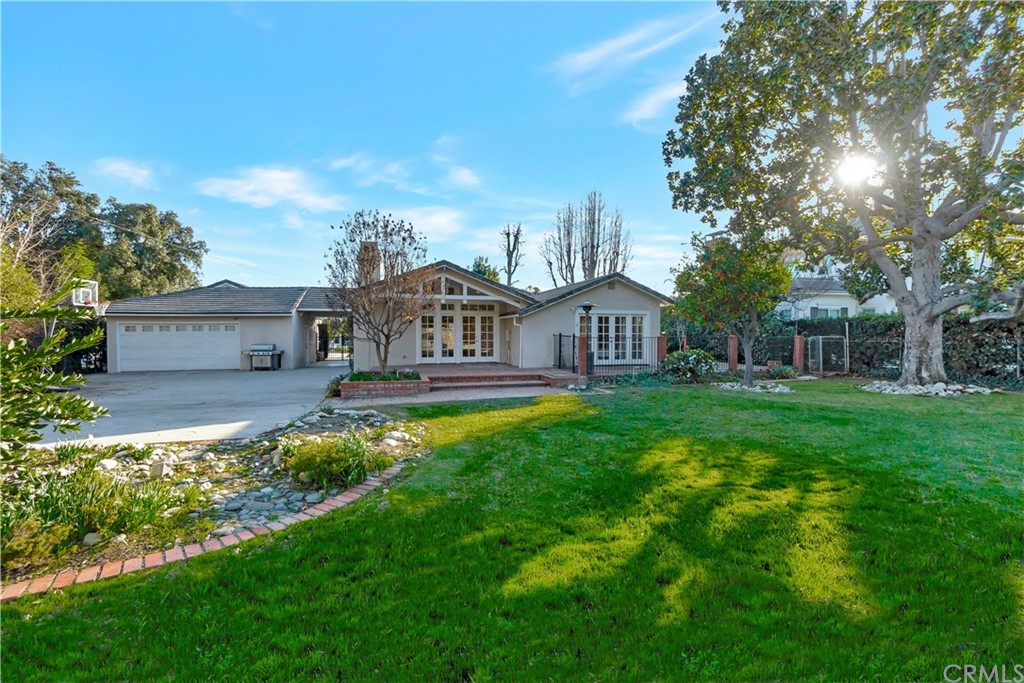 111 West Lemon Avenue Arcadia, CA 91007 - Photo 38 of 46 a view of a house with garden and a chairs