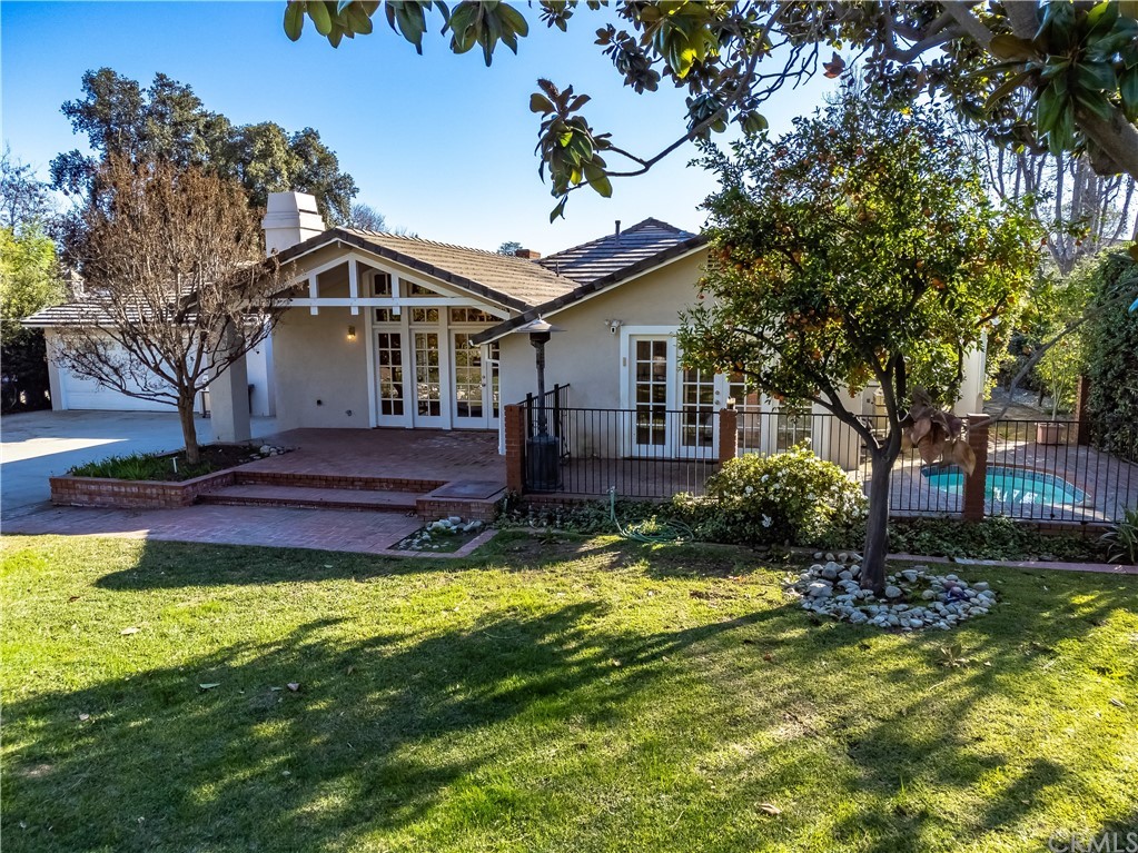 111 West Lemon Avenue Arcadia, CA 91007 - Photo 40 of 46 a front view of a house with swimming pool