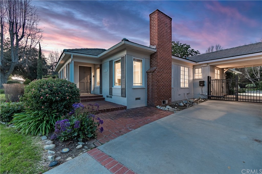 111 West Lemon Avenue Arcadia, CA 91007 - Photo 4 of 46 a front view of a house with garden