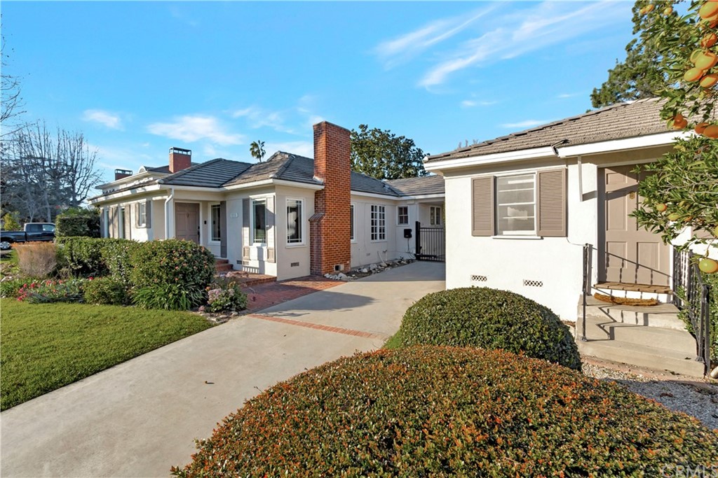111 West Lemon Avenue Arcadia, CA 91007 - Photo 7 of 46 a front view of a house with a yard
