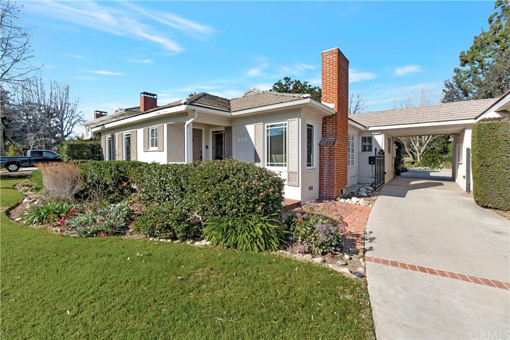 111 West Lemon Avenue Arcadia, CA 91007 - Photo 8 of 46 a front view of a house with a garden