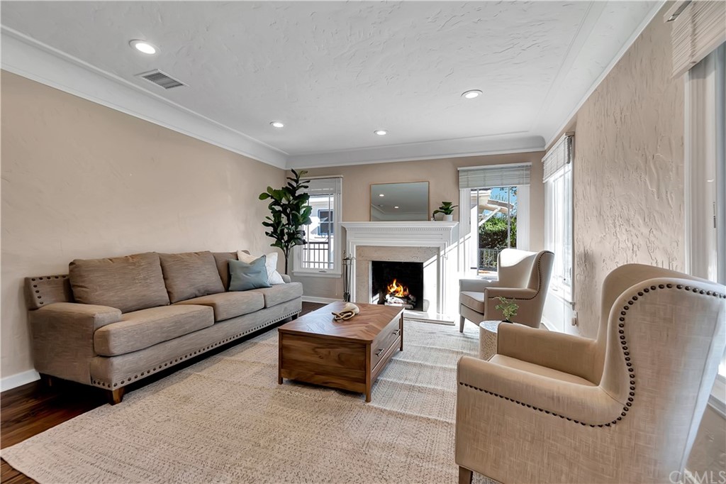 111 West Lemon Avenue Arcadia, CA 91007 - Photo 10 of 46 a living room with furniture and a fireplace