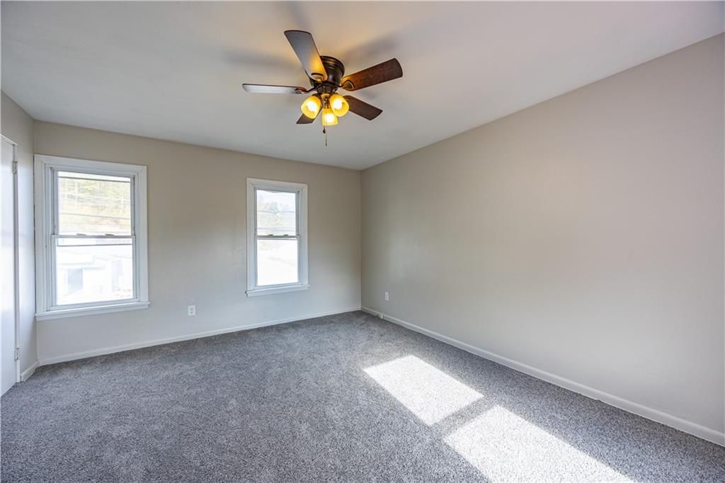489 Indiana Road Creekside, PA 15732 - Photo 12 of 22 a view of an empty room with a window
