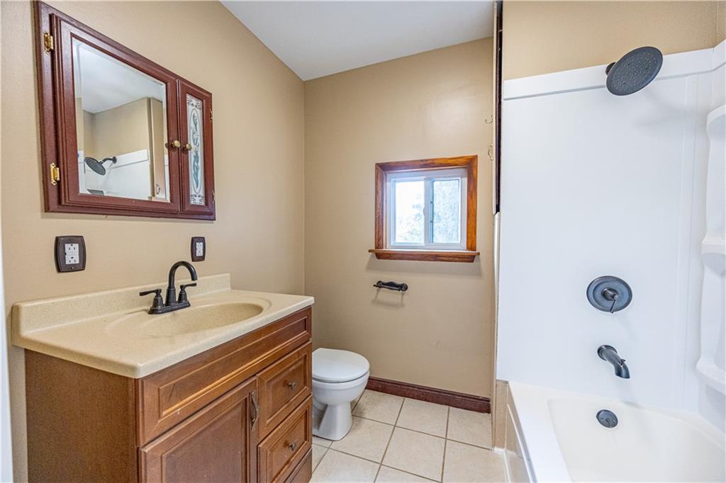 489 Indiana Road Creekside, PA 15732 - Photo 14 of 22 a bathroom with a sink and a mirror