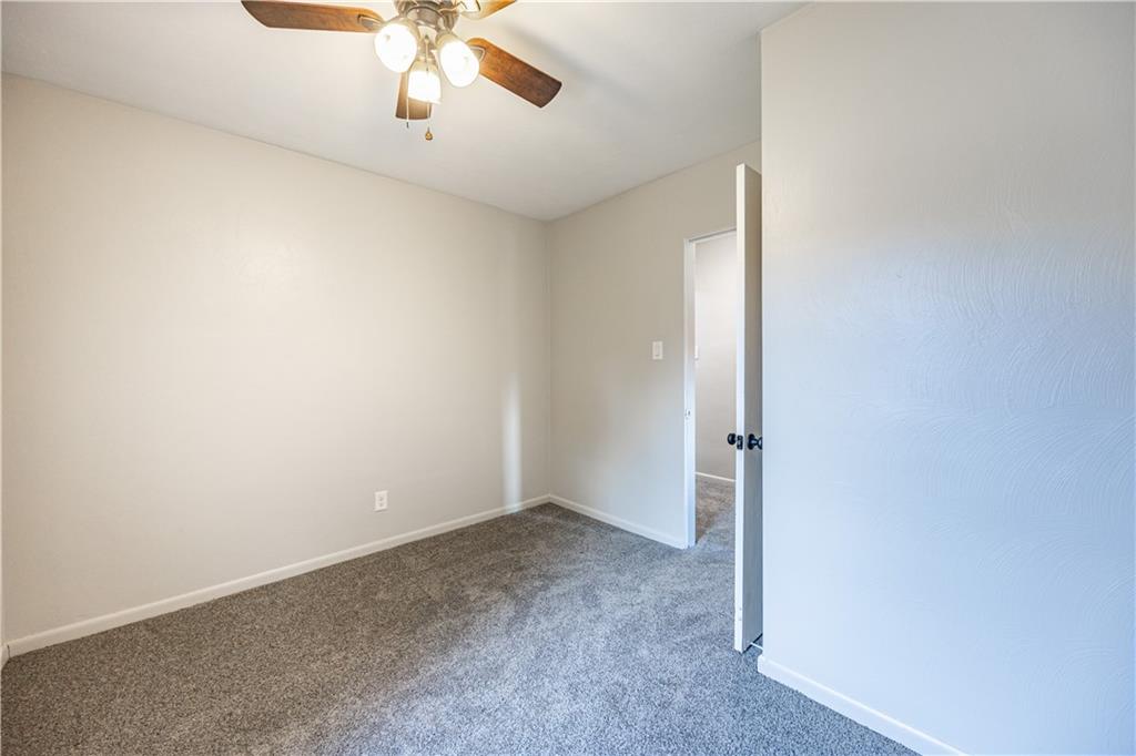 489 Indiana Road Creekside, PA 15732 - Photo 16 of 22 an empty room with chandelier fan