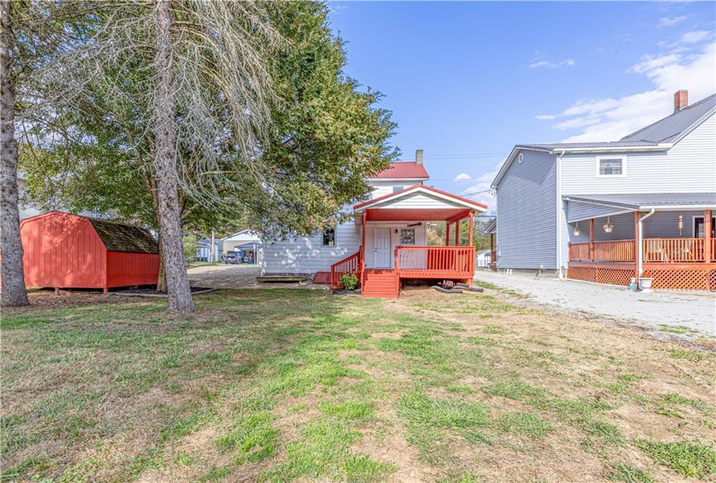 489 Indiana Road Creekside, PA 15732 - Photo 22 of 22 a view of a house with a yard