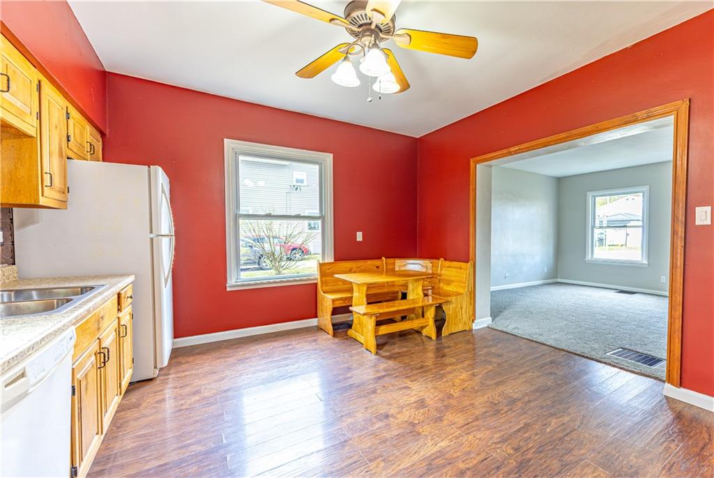489 Indiana Road Creekside, PA 15732 - Photo 7 of 22 a view of a livingroom with furniture and a ceiling fan
