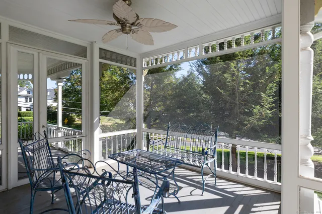a view of a patio with a large window