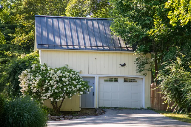 a view of a house with a garden