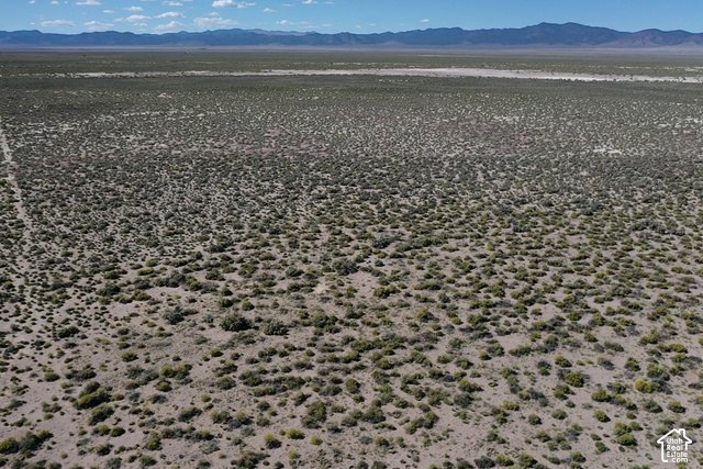 350 West Antelope Springs Road Beryl, UT 84714 - Photo 14 of 14 Expansive open land with arid vegetation and distant mountain ranges