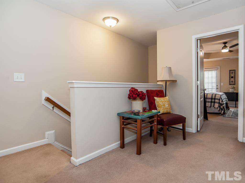 1311 Still Monument Way Raleigh, NC 27603 - Photo 15 of 33 a livingroom with furniture and a lamp