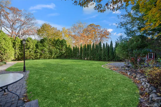 a view of a backyard with a garden