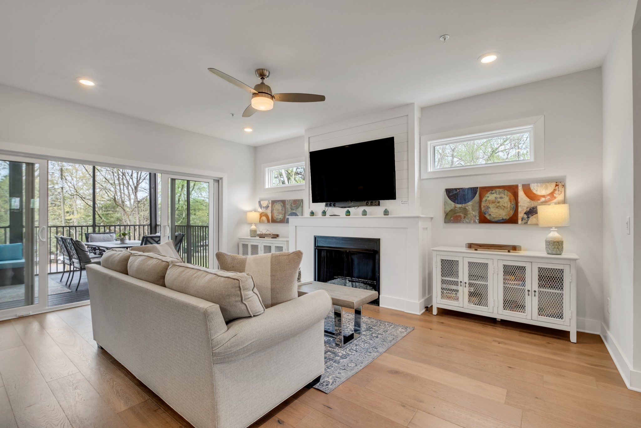 1144 Lock 4 Road, Unit F5 Gallatin, TN 37066 - Photo 12 of 40 a living room with furniture a flat screen tv and a fireplace