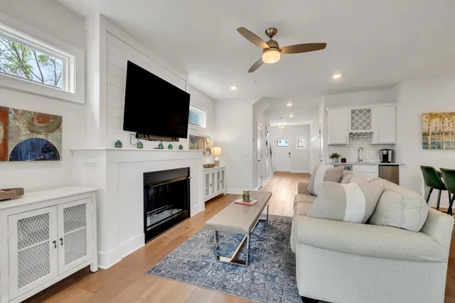 a kitchen with stainless steel appliances granite countertop a sink a microwave cabinets and a stove