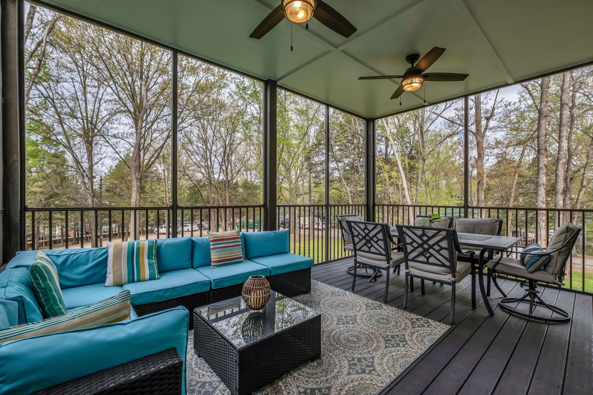 1144 Lock 4 Road, Unit F5 Gallatin, TN 37066 - Photo 25 of 40 a roof deck with couches and potted plants with wooden floor