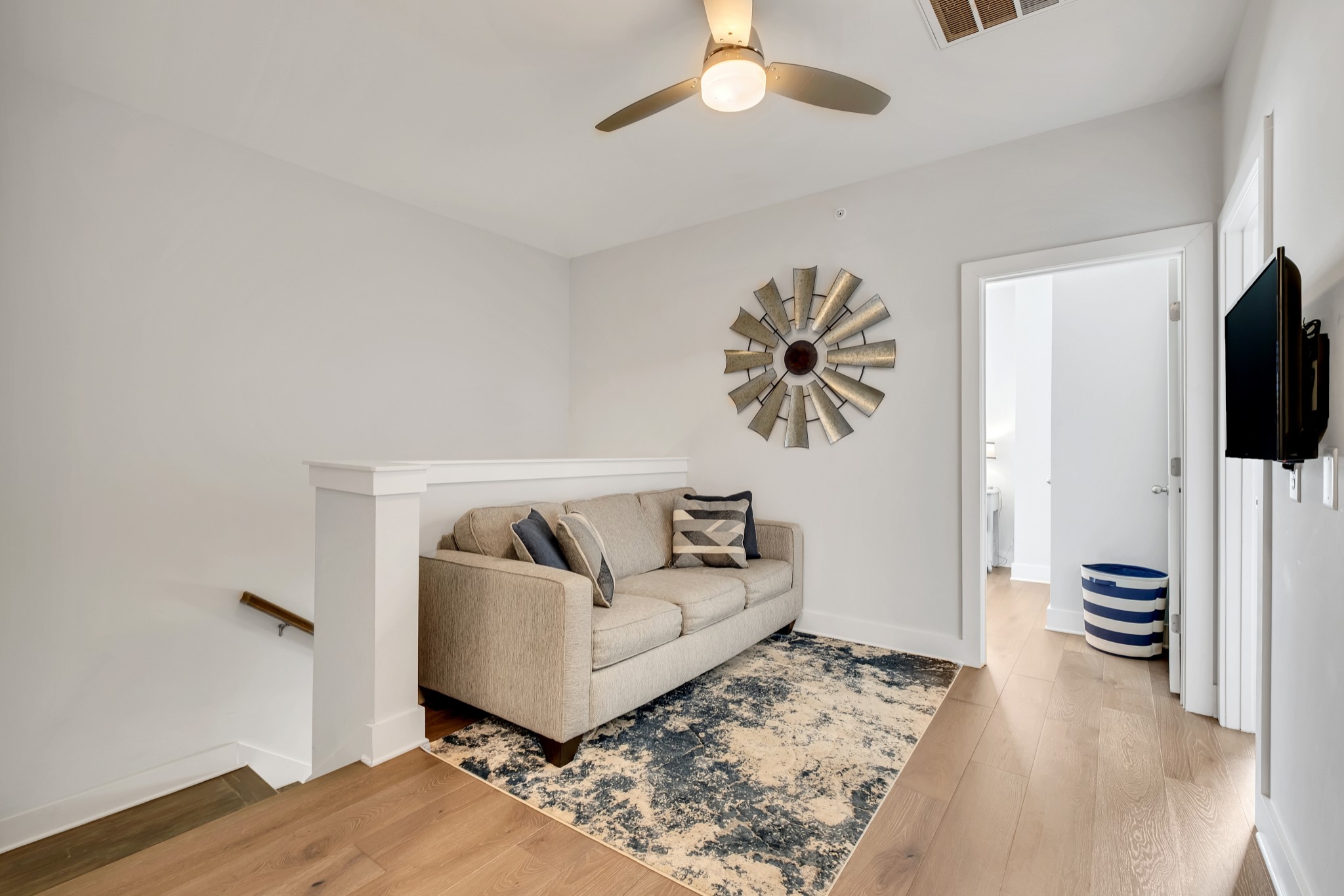 1144 Lock 4 Road, Unit F5 Gallatin, TN 37066 - Photo 26 of 40 a living room with furniture and a flat screen tv