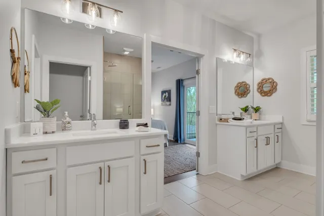 a view of a livingroom with workspace and a window