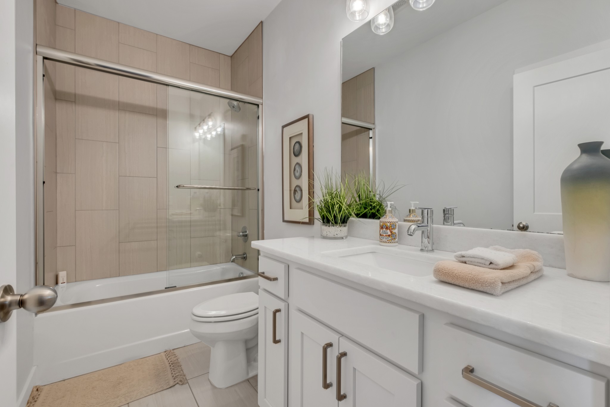 1144 Lock 4 Road, Unit F5 Gallatin, TN 37066 - Photo 37 of 40 a bathroom with a sink a toilet and shower