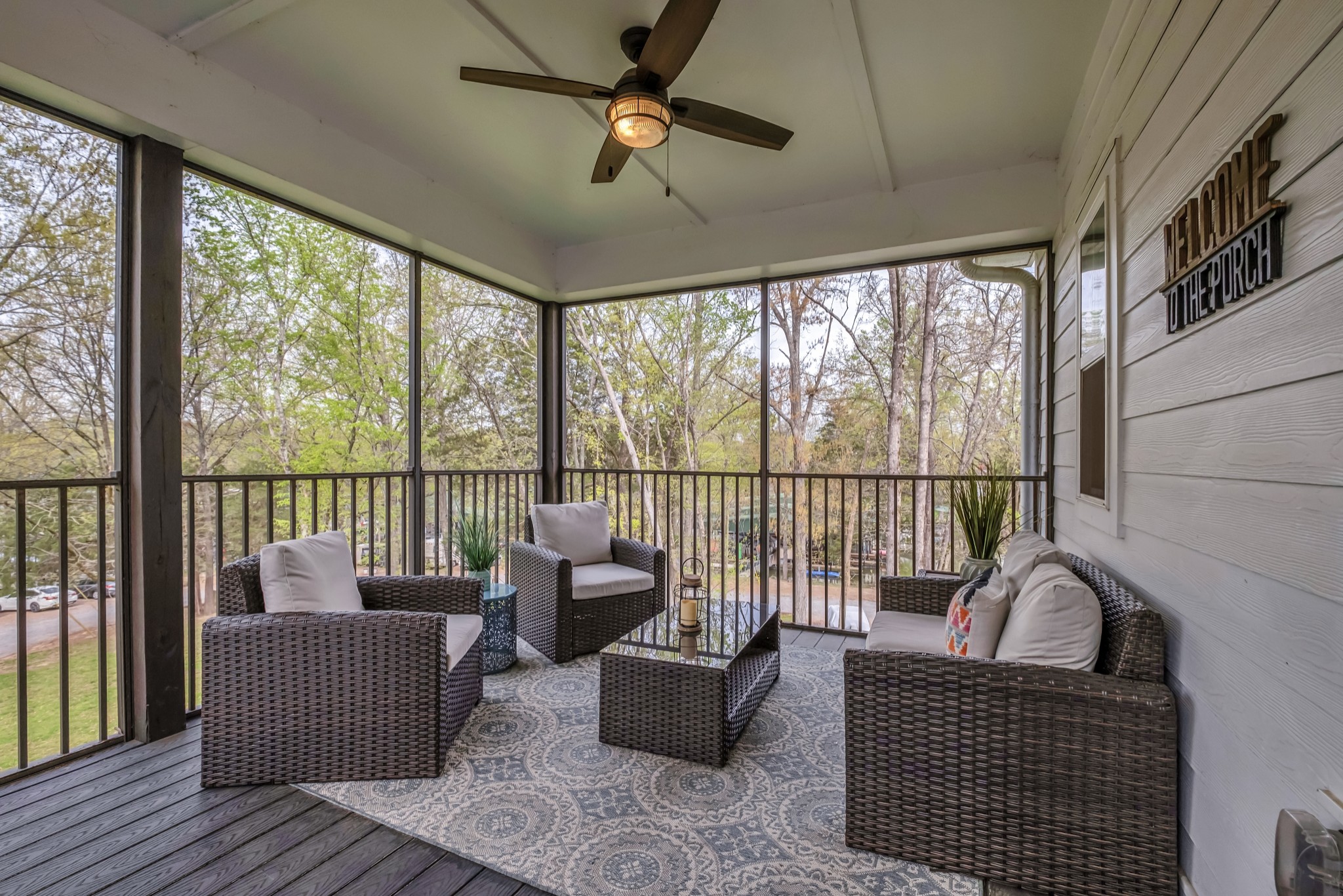 1144 Lock 4 Road, Unit F5 Gallatin, TN 37066 - Photo 39 of 40 a living room with furniture and floor to ceiling windows