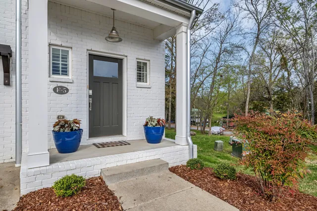 a view of a potted plants in front of a house