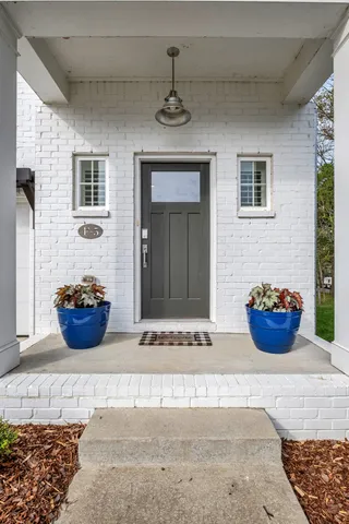a view of a entryway door front of house