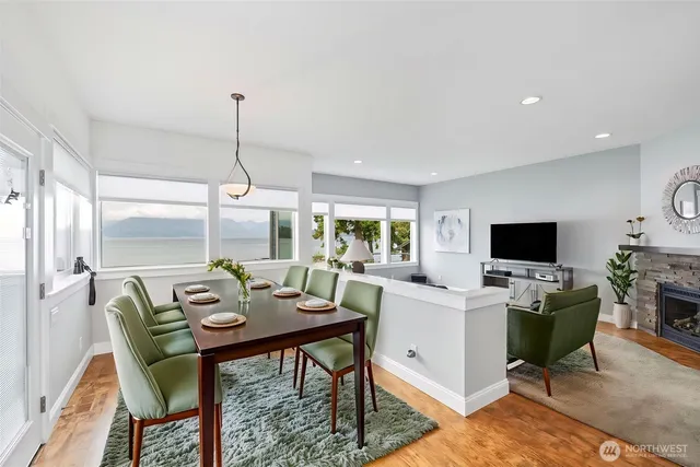 a bedroom with a bed and a potted plant