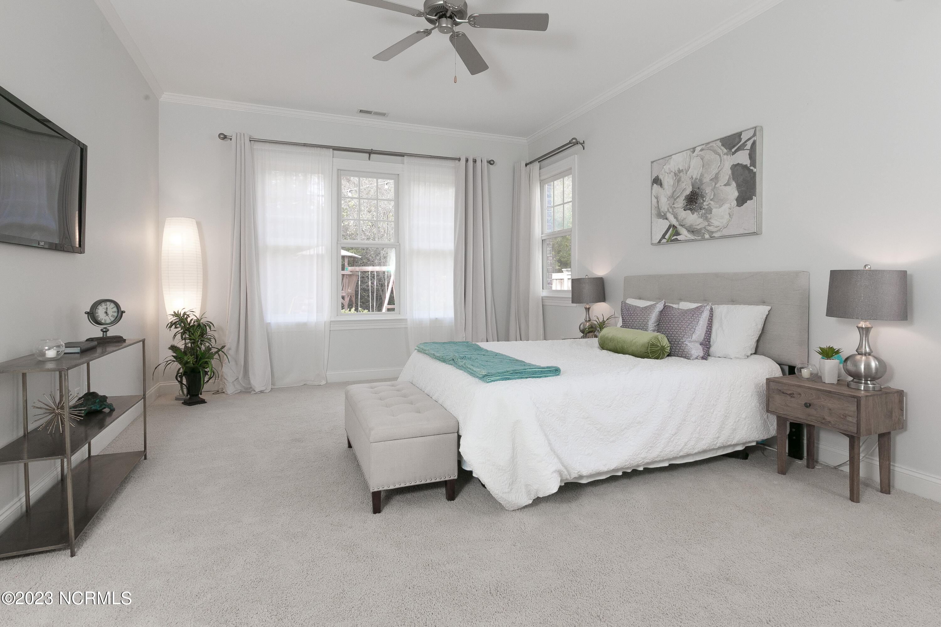 535 Tanbridge Road Wilmington, NC 28405 - Photo 43 of 50 Large master bedroom will ample natural light from five windows.