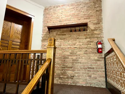 a view of door with wooden floor