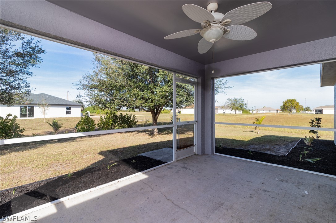 2204 Nelson Road North Cape Coral, FL 33993 - Photo 18 of 22 a view of a porch and garden