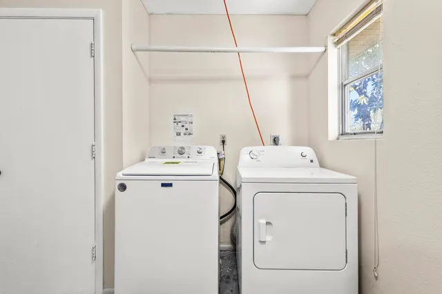 a house view with a garden space