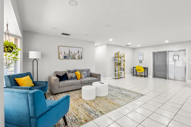 a living room with furniture and window