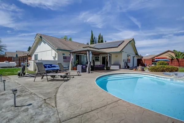 a view of a city street from a house