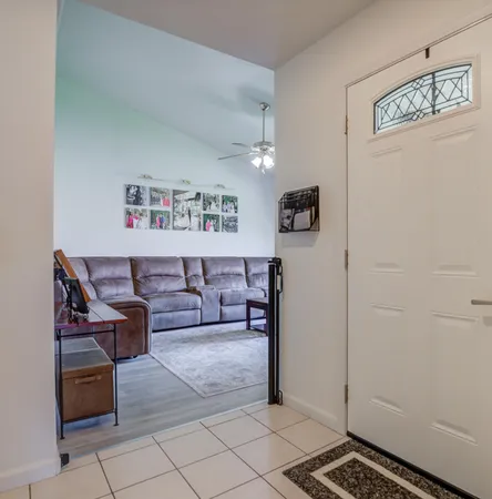 a living room with furniture and a couch