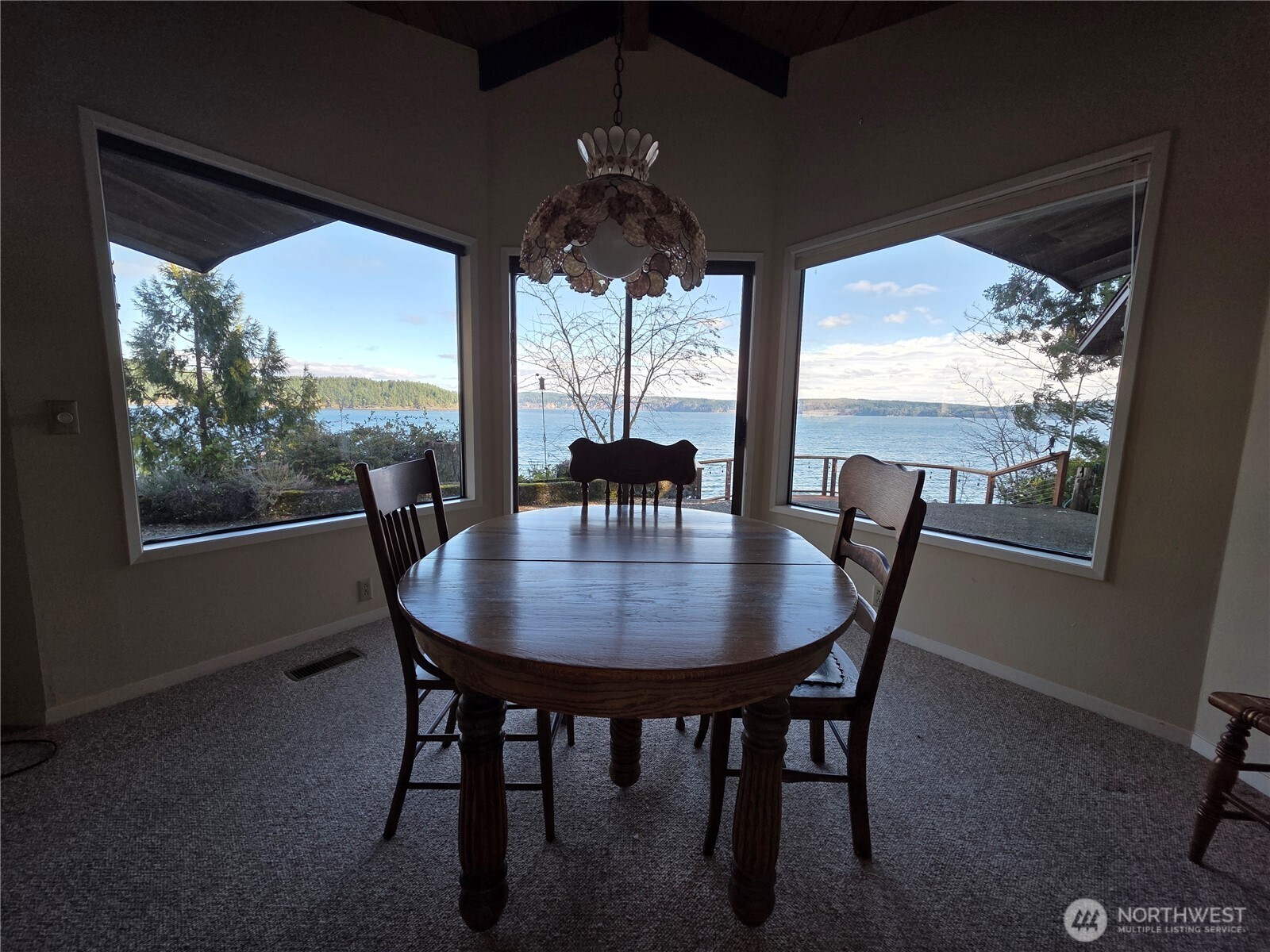 81 Wawa Point Place Brinnon, WA 98320 - Photo 14 of 37 a view of a dining room with furniture window and outside view