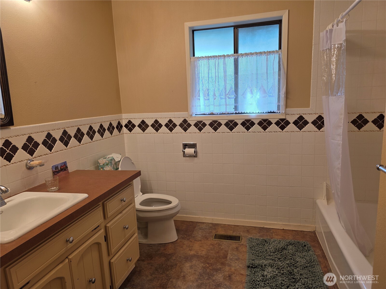 81 Wawa Point Place Brinnon, WA 98320 - Photo 28 of 37 a bathroom with a toilet and a shower